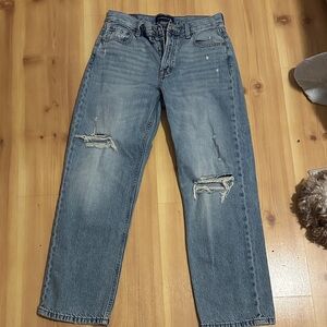 Woman’s Blue Distressed Jeans